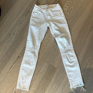 Frame lightly distressed white jeans